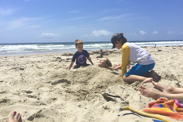 The little guys enjoying the sand