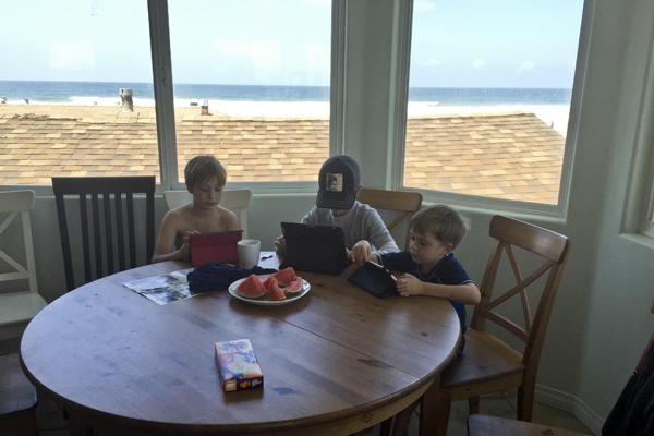 The kids enjoyed video games at the breakfast table while the adults enjoyed the view