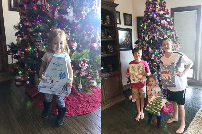Kids holding advent calendars
